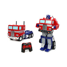 Load image into Gallery viewer, Jada Toys – Transformers Optimus Prime Converting RC Vehicle – Kids Toys Gift with Transformation from Truck to Robot – Lights &amp; Sounds – Full Function Remote Control – 13&quot; Long